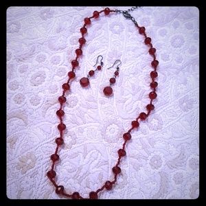 Brand new ruby red necklace with matching earrings